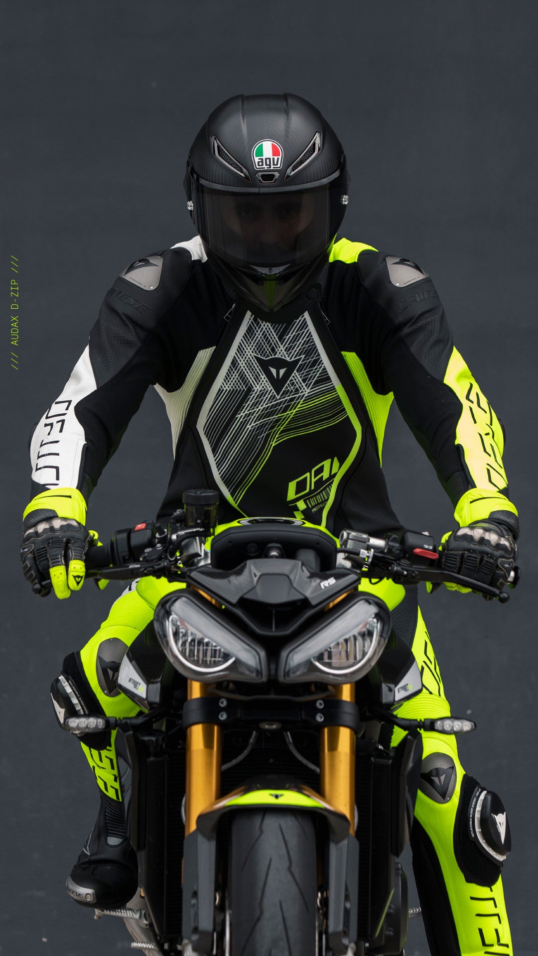 Dainese Audax D-ZIP Tek Parça Deri Kombinasyonu – Perfore Yarış Tulumu | Erkek | Siyah/Neon Sarı 