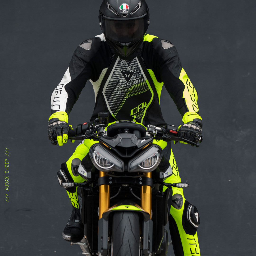 Dainese Audax D-ZIP Tek Parça Deri Kombinasyonu – Perfore Yarış Tulumu | Erkek | Siyah/Neon Sarı 